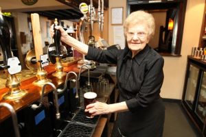 Dolly Saville http://www.thesun.co.uk/sol/homepage/news/3816098/Dolly-97-is-oldest-barmaid-in-the-world.html